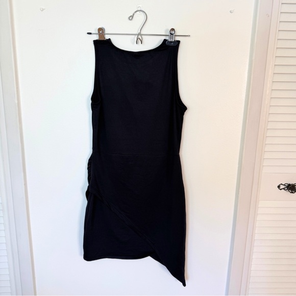 Asymmetrical hem little black bodycon dress, flattering, very stretchy, size S-M - Picture 4 of 6
